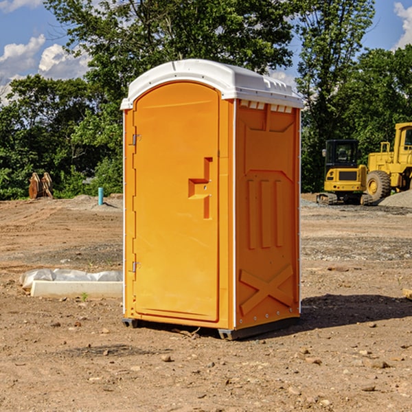 what is the cost difference between standard and deluxe portable toilet rentals in Gaines County